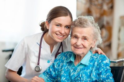 senior woman with her caregiver at home